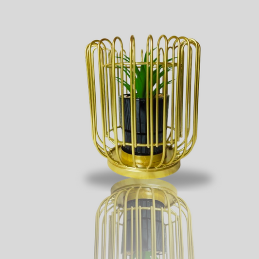 A gold-colored Nordic metal flower pot vase with a small plant inside, best for office and home decor
