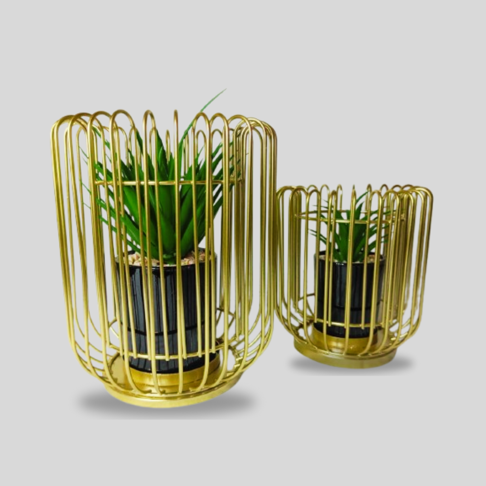 Two cylindrical gold metal flower pot vases of different sizes, with a geometric design, displaying green plants inside. perfect for home and office table decor 